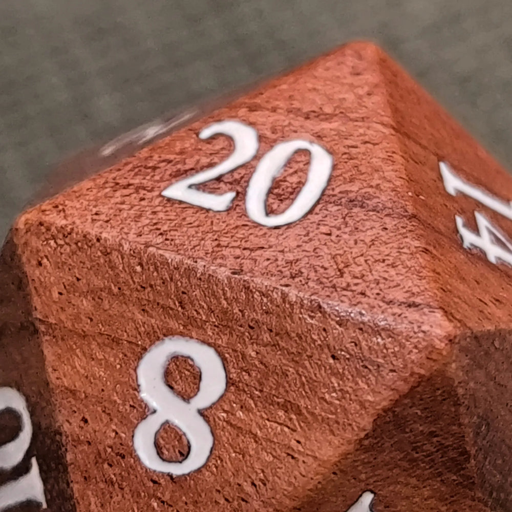 Macro shot of Oversized 33mm Rosewood D20