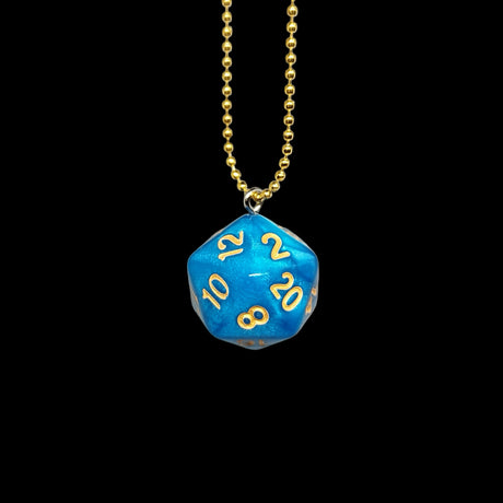 Turquoise D20 die pendant with gold numbers on a gold chain