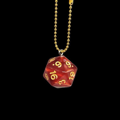 Red D20 die with gold numbers on a gold chain 