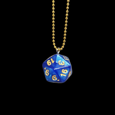 Blue polyhedral die pendant on a gold chain