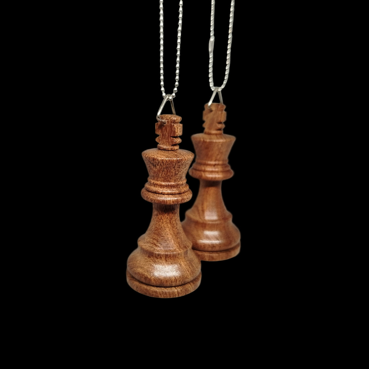 Wooden chess piece pendants on chains 